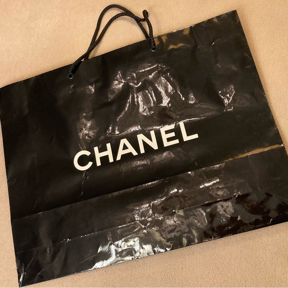 Chanel, high gloss glazed paper bag in black with White Chanel block letters
